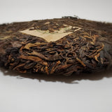 Yiwu Ancient Tree Raw Pu-erh Tea Cake – 2006 Aged Sheng Pu'er 357g Pressed Tea High-Altitude Yunnan Arbor Leaves Smooth, Mature, Deep Flavor Ideal for Long-Term Brewing